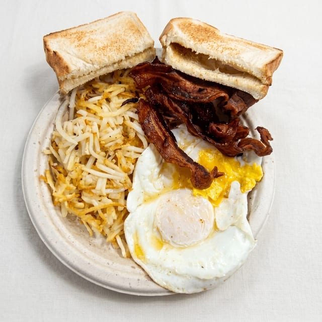 2 Eggs, Bacon or Sausage, Hash Browns & Toast.
